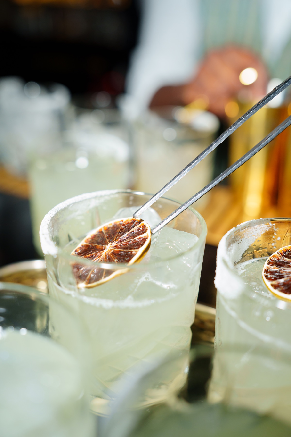 Cocktails finished with dried citrus garnish